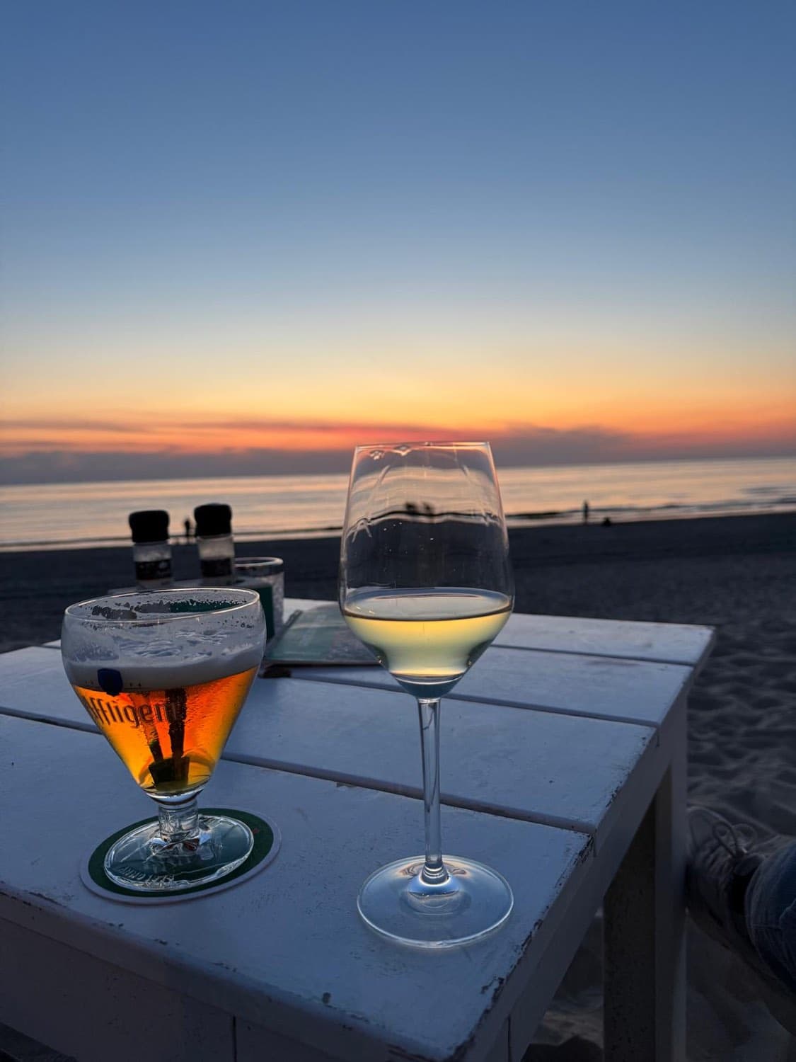 Drinks on the beach at sunset
