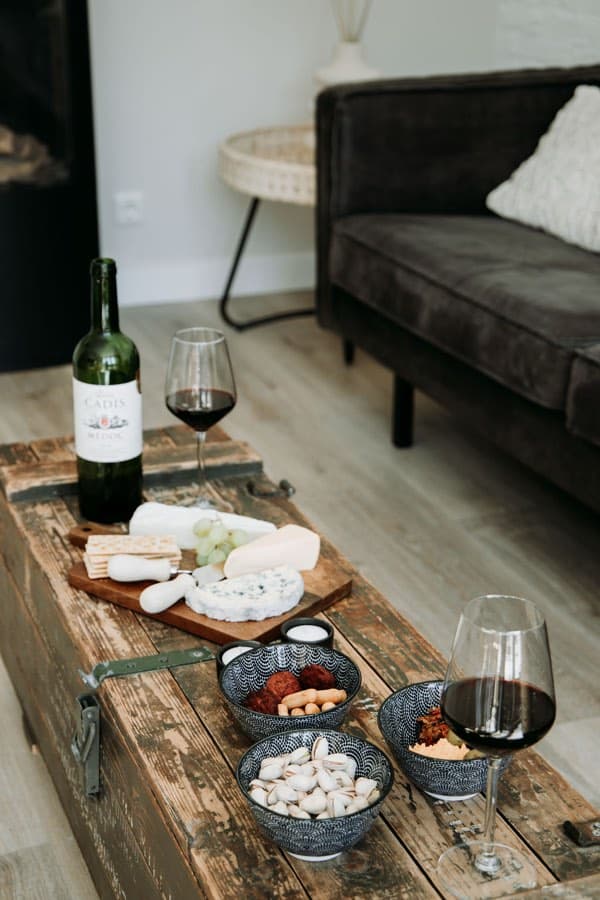 Drinks by the fire in the holiday home